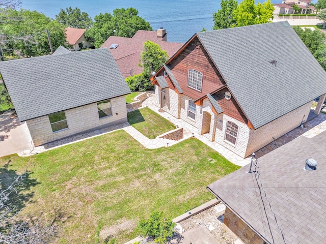 bird's eye view with a water view