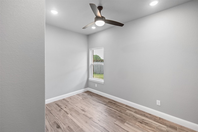 unfurnished room with light hardwood / wood-style flooring and ceiling fan