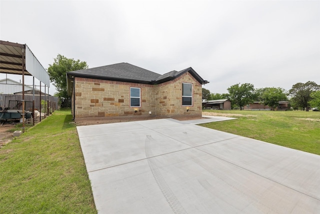 exterior space featuring a yard