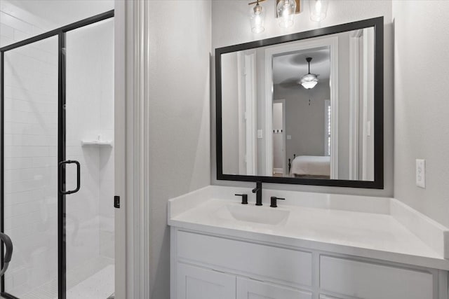 bathroom with vanity and walk in shower