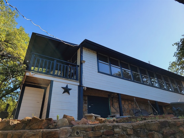 exterior space with a balcony