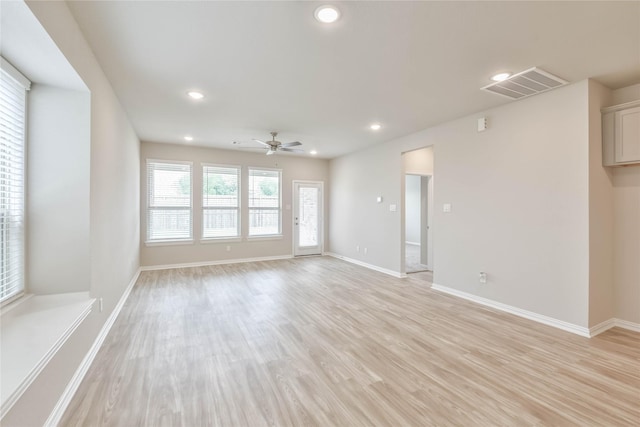 unfurnished living room featuring visible vents, ceiling fan, light wood finished floors, and recessed lighting
