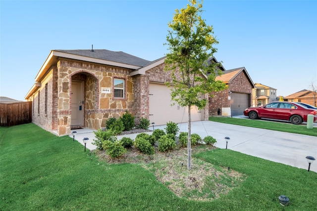 ranch-style house featuring a garage and a front yard