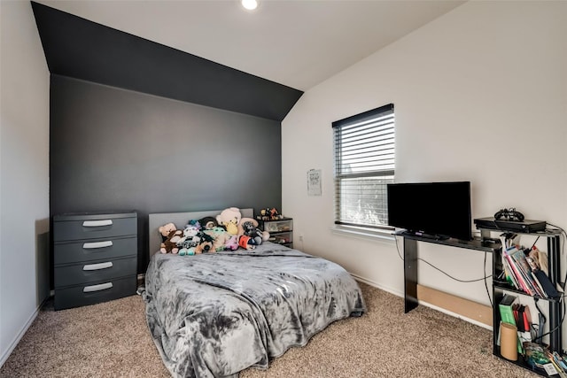 bedroom with carpet and lofted ceiling