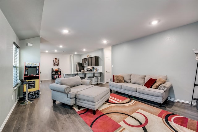 living room featuring dark hardwood / wood-style floors