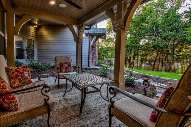 view of patio featuring ceiling fan