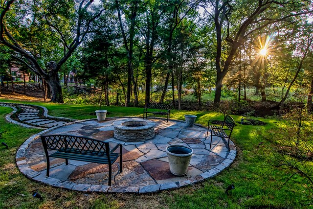 view of patio featuring a fire pit