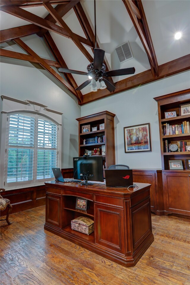 office space featuring vaulted ceiling, ceiling fan, and light wood-type flooring