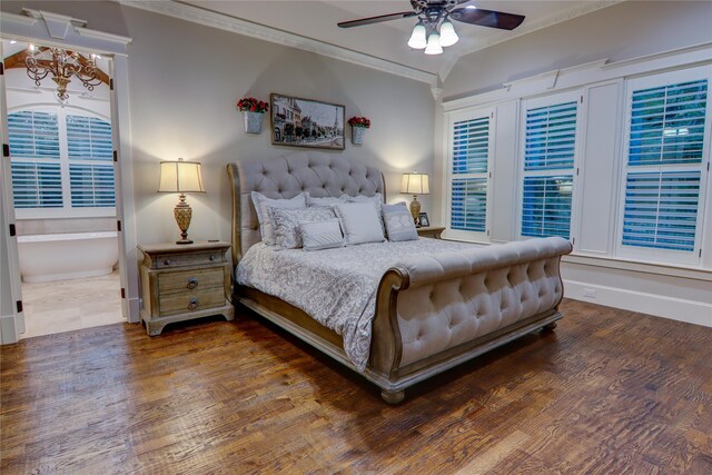 bedroom featuring crown molding, dark hardwood / wood-style floors, and ceiling fan with notable chandelier