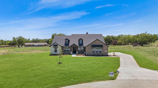 view of front facade with a front lawn