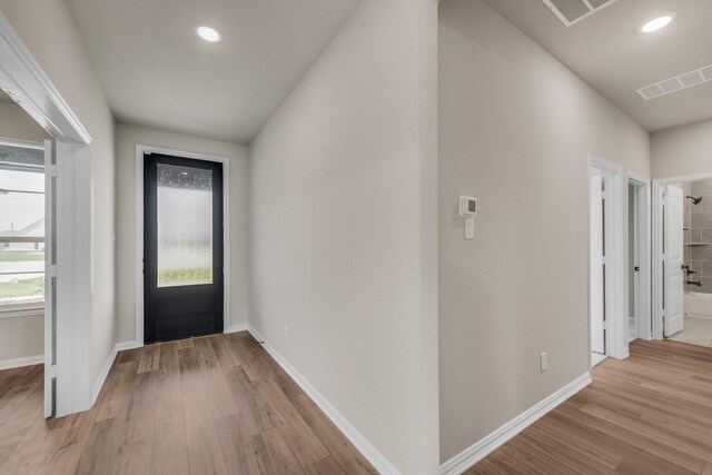 entrance foyer with hardwood / wood-style floors