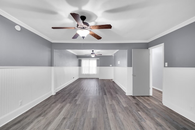 unfurnished living room featuring crown molding, hardwood / wood-style flooring, and ceiling fan