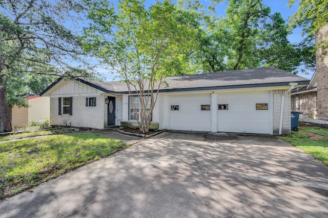 single story home with a garage