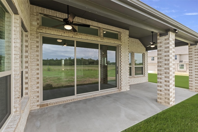 view of patio / terrace featuring ceiling fan