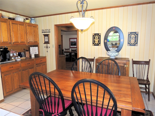 tiled dining area with crown molding