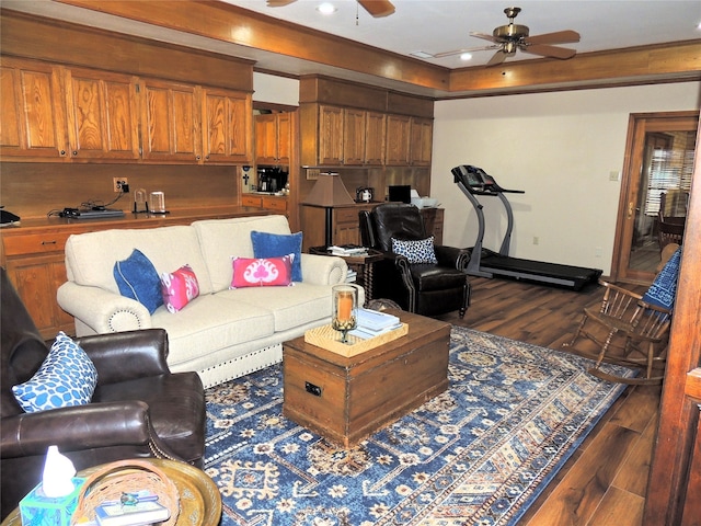 living room with dark wood-type flooring and ceiling fan