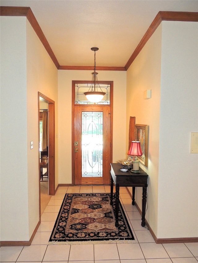 entryway featuring crown molding and light tile floors