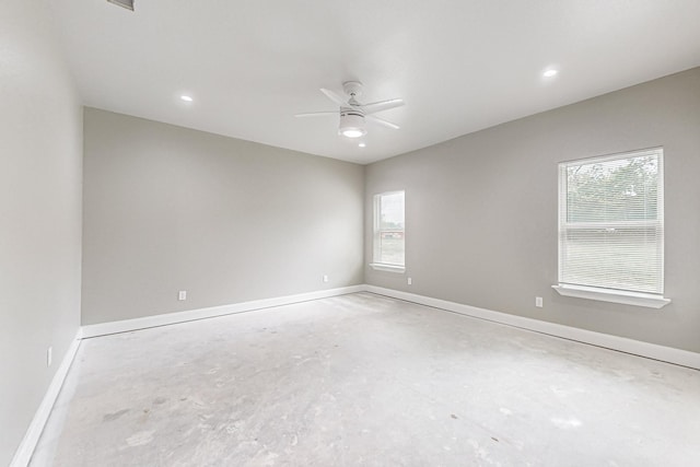 unfurnished room with ceiling fan