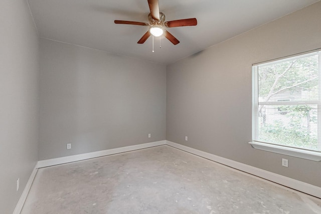 spare room with ceiling fan