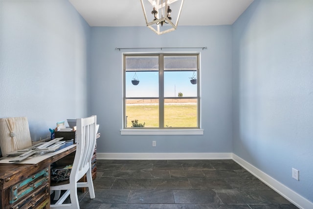 unfurnished office featuring a notable chandelier and dark tile flooring