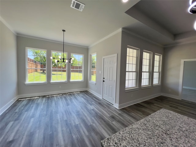 hall with a raised ceiling and dark wood-type flooring