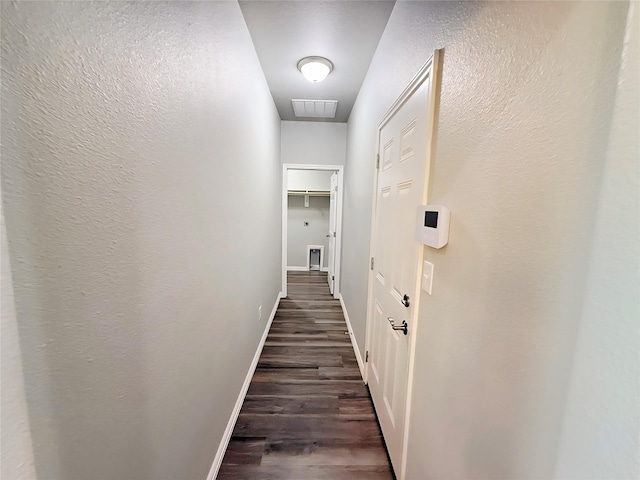 1507 Langston St, Fort Worth, TX 76105 - hallway featuring dark wood-style flooring and baseboards
