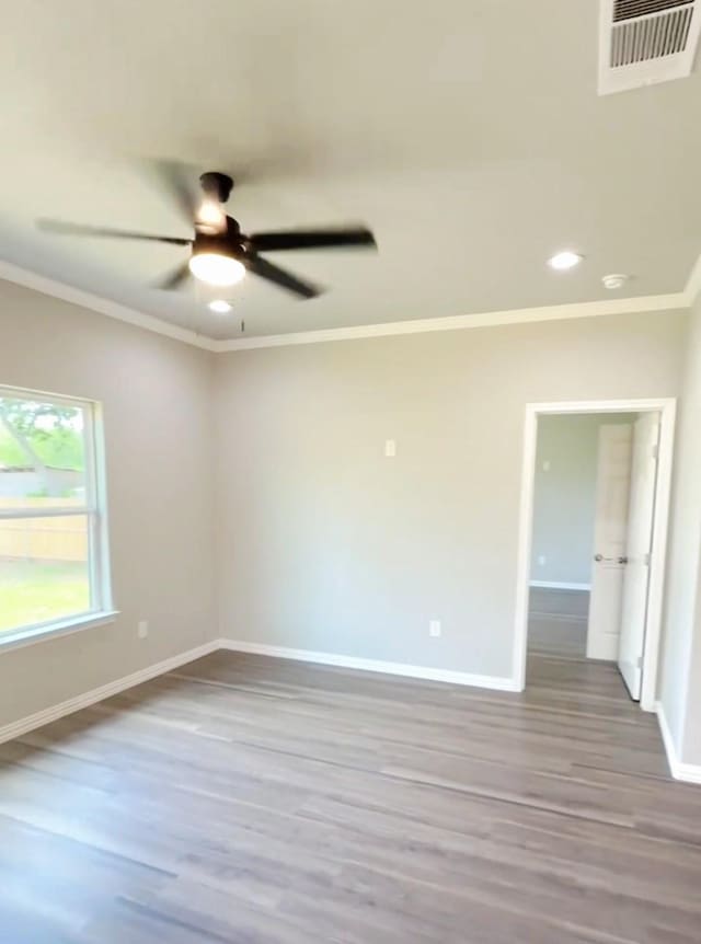 1507 Langston St, Fort Worth, TX 76105 - unfurnished room featuring crown molding, wood finished floors, ceiling fan, and recessed lighting