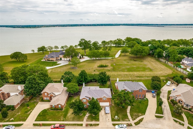 aerial view with a water view and a residential view