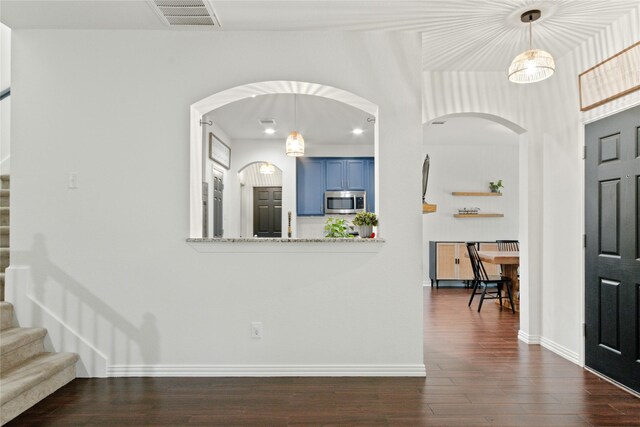 foyer featuring dark hardwood / wood-style floors