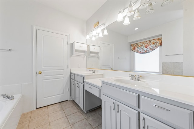 bathroom featuring a relaxing tiled bath, tile flooring, oversized vanity, and double sink