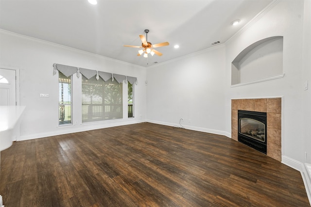 unfurnished living room featuring ceiling fan, dark hardwood / wood-style floors, and a fireplace