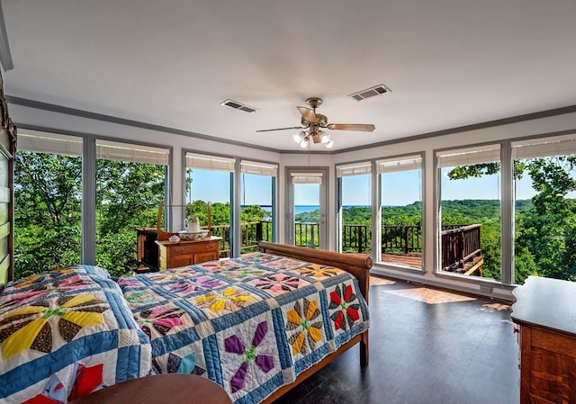 interior space with ceiling fan and dark hardwood / wood-style floors