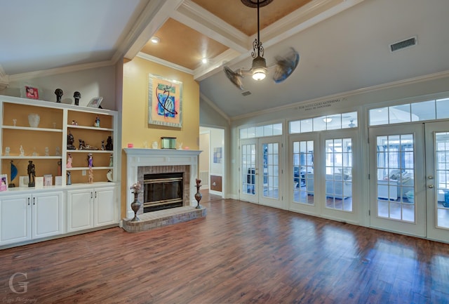 living room with ceiling fan, a fireplace, dark hardwood / wood-style floors, ornamental molding, and french doors