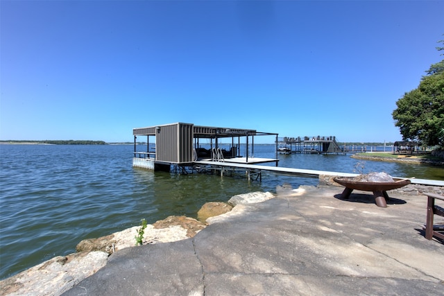 dock area with a water view