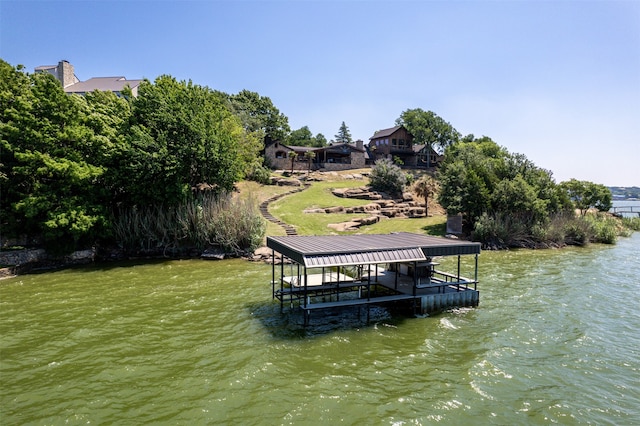 dock area with a water view