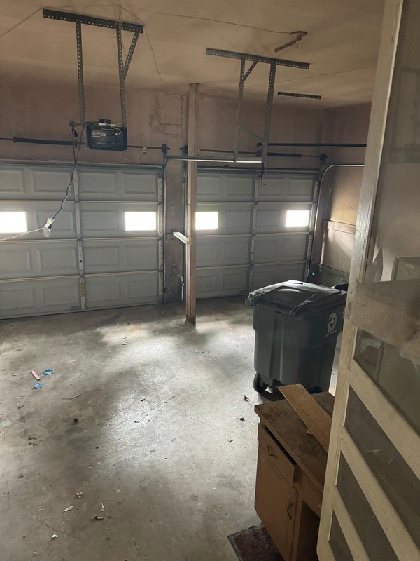 garage featuring a garage door opener