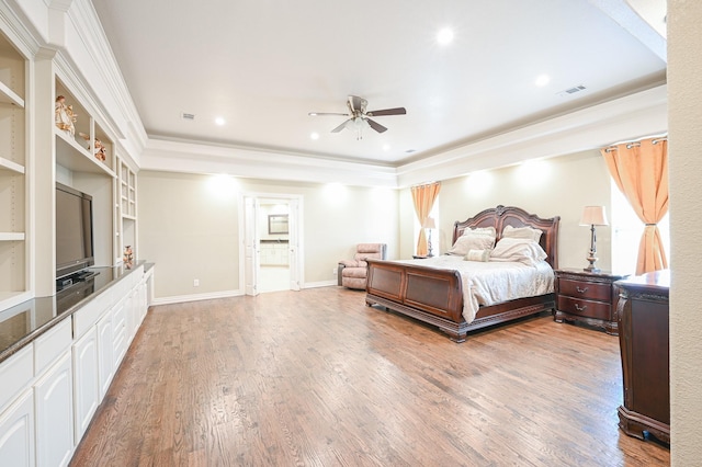 bedroom featuring wood-type flooring, ceiling fan, and crown molding