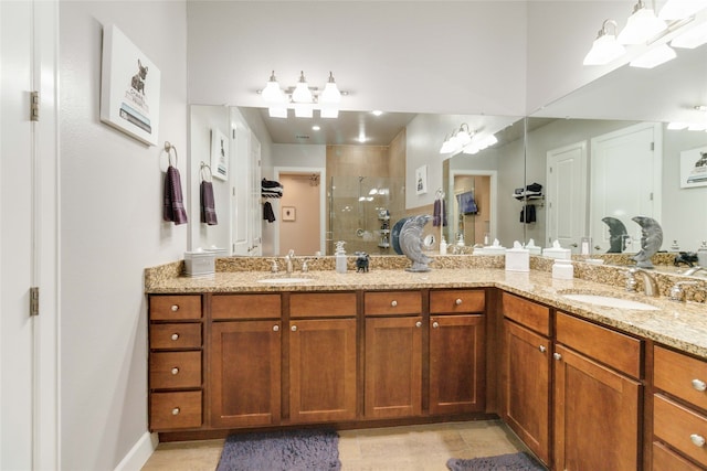 bathroom featuring vanity and an enclosed shower