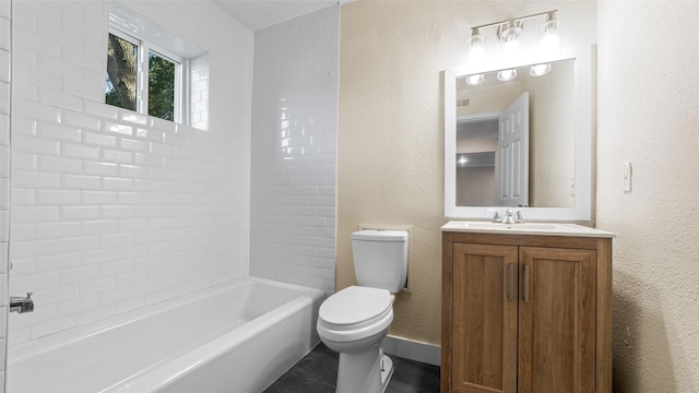 full bathroom featuring toilet, bathing tub / shower combination, tile patterned floors, and vanity