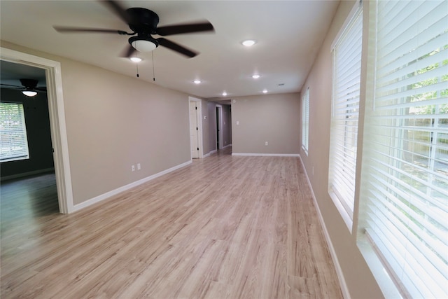 unfurnished room with light hardwood / wood-style flooring