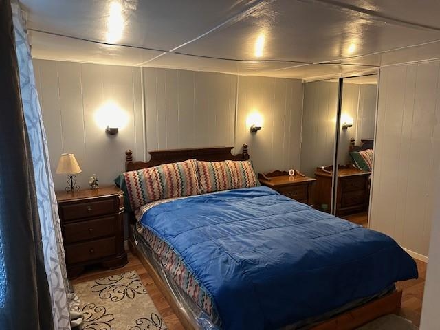 bedroom featuring light wood-type flooring