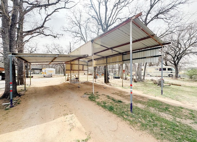 exterior space featuring a detached carport
