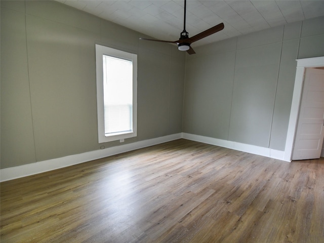 unfurnished room with ceiling fan and light hardwood / wood-style floors