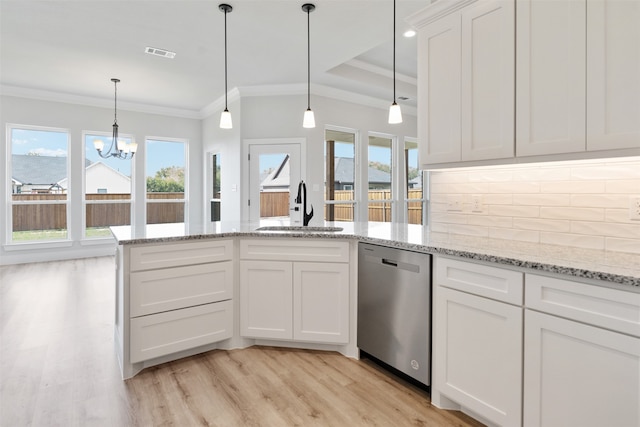 kitchen featuring tasteful backsplash, light hardwood / wood-style flooring, sink, dishwasher, and white cabinets