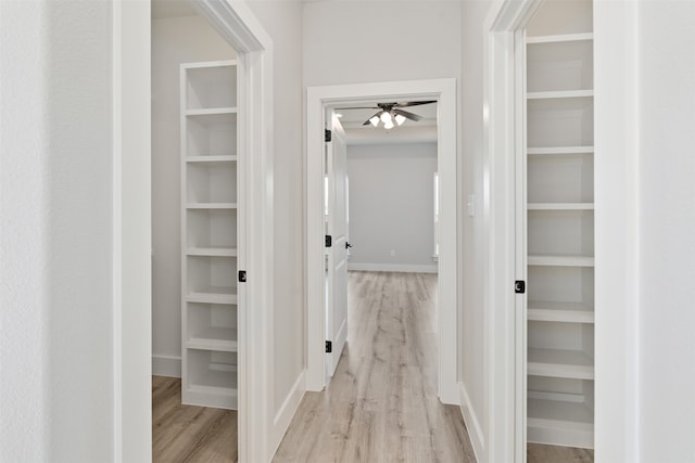 corridor featuring light hardwood / wood-style flooring