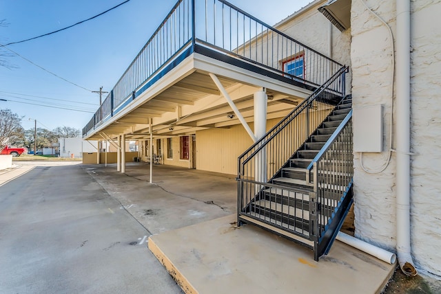 exterior space with a carport