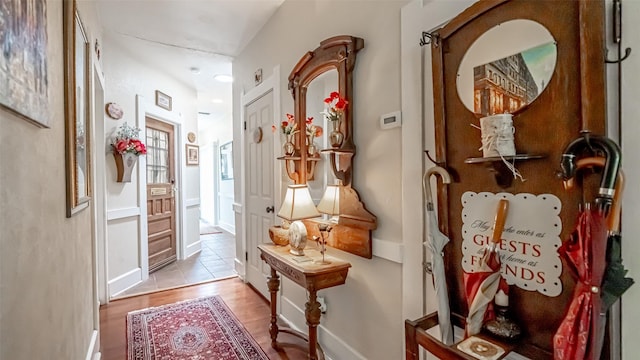 corridor featuring light hardwood / wood-style floors