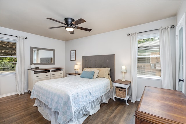 bedroom featuring ceiling fan and dark hardwood / wood-style flooring