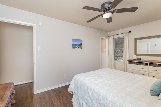 bedroom with dark wood-type flooring and ceiling fan