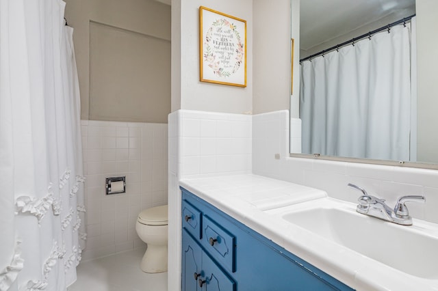 bathroom with tile floors, backsplash, toilet, and tile walls